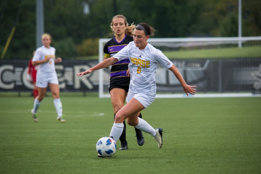 Ally Perkins (6) fights toward the goal during the game against Lipscomb.