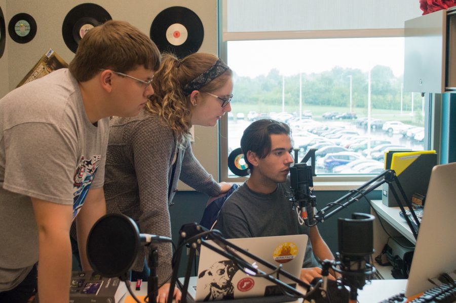 Assistant Manager Alex Gray, General Manager Emily Cay and DJ Nic Vitale record a show in Norse Code Radios Griffin Hall studio.
