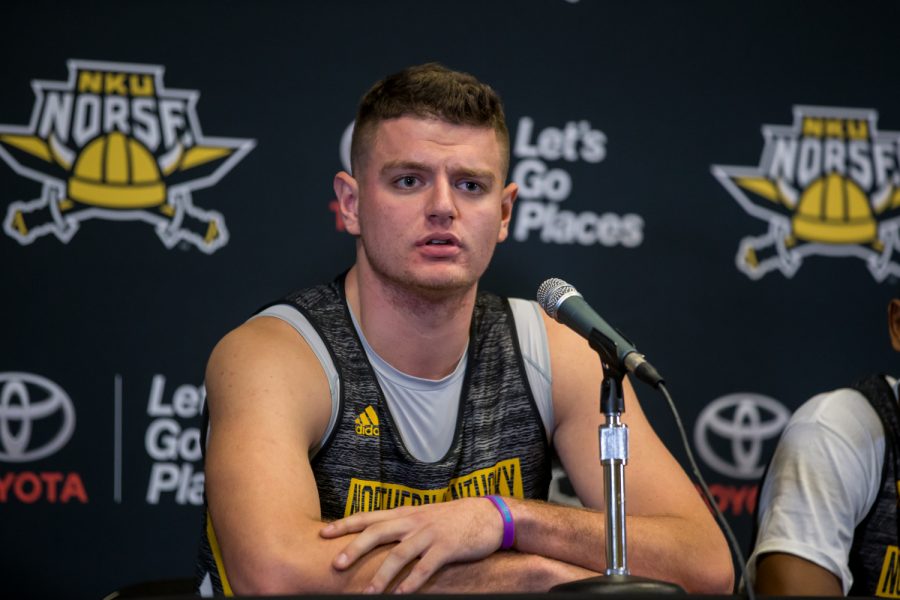 Drew McDonald (34) talks during basketball media day.