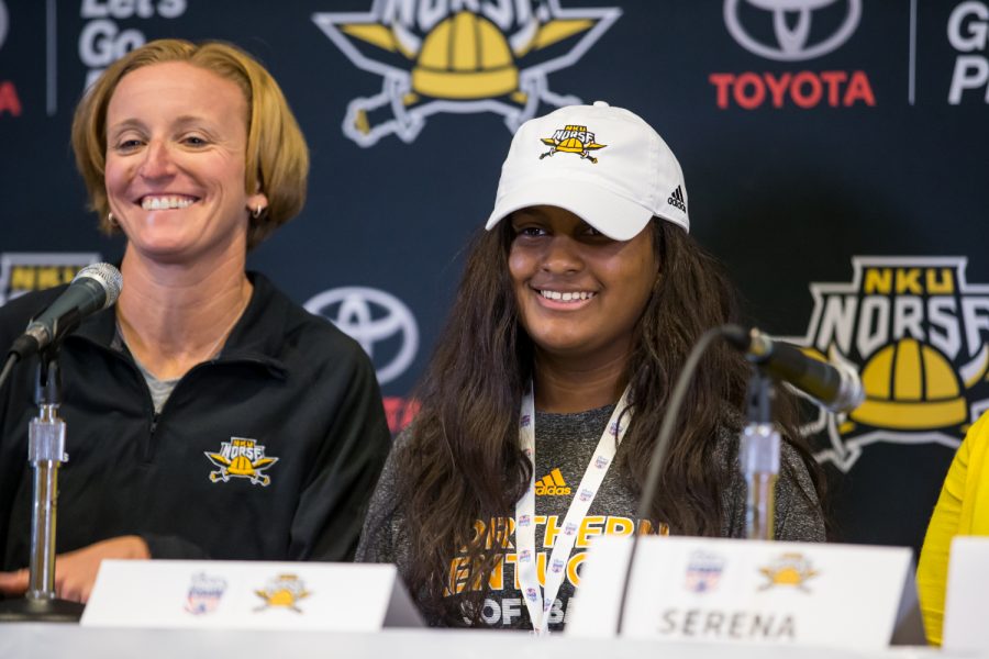Destiny Owen, a member of team IMPACT, smiles with Head coach Kathryn Gleason after signing to become a member of the NKU softball team