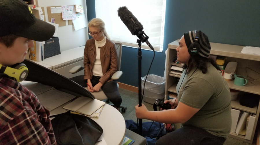 Student James Bailey and Phyl Alderette hold the set for actor Callie Bailey.