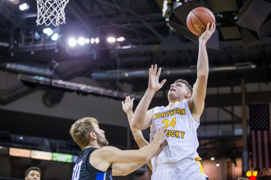 Drew McDonald (34) goes up for a shot during the game against Thomas More. McDonald had 14 points during the game.