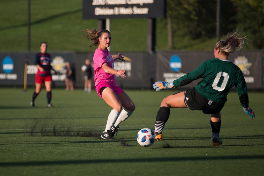 Shawna Zaken (8) shoots during the game against Detroit Mercy. She had one goal for the Norse during the game.
