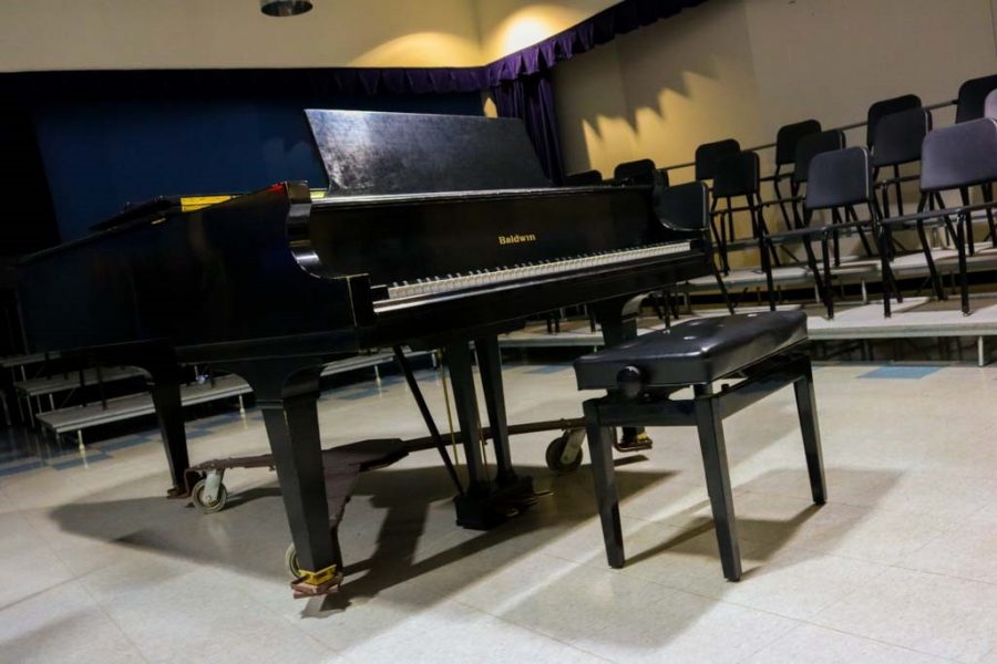 Music students have the ability to practice the piano in practice rooms.