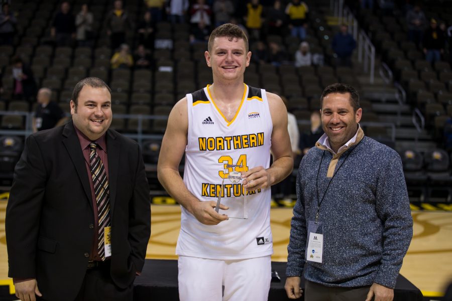 Drew McDonald (34) is recognized as the tournaments Most Valuable Player following the game against Coastal Carolina. McDonald had 31 points on the game.