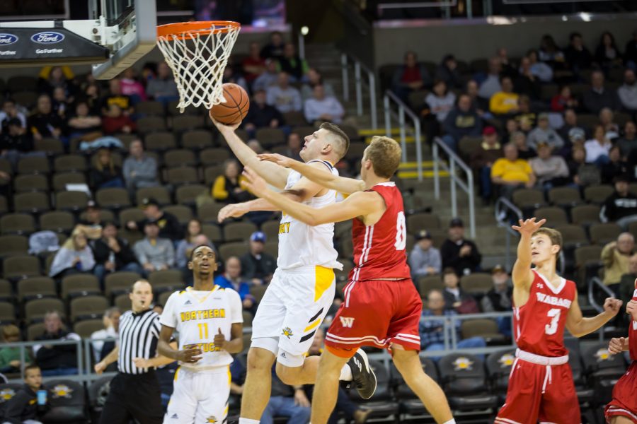 Drew McDonald (34) goes up for a shot during the game against Wabash. McDonald had 10 points on the game.