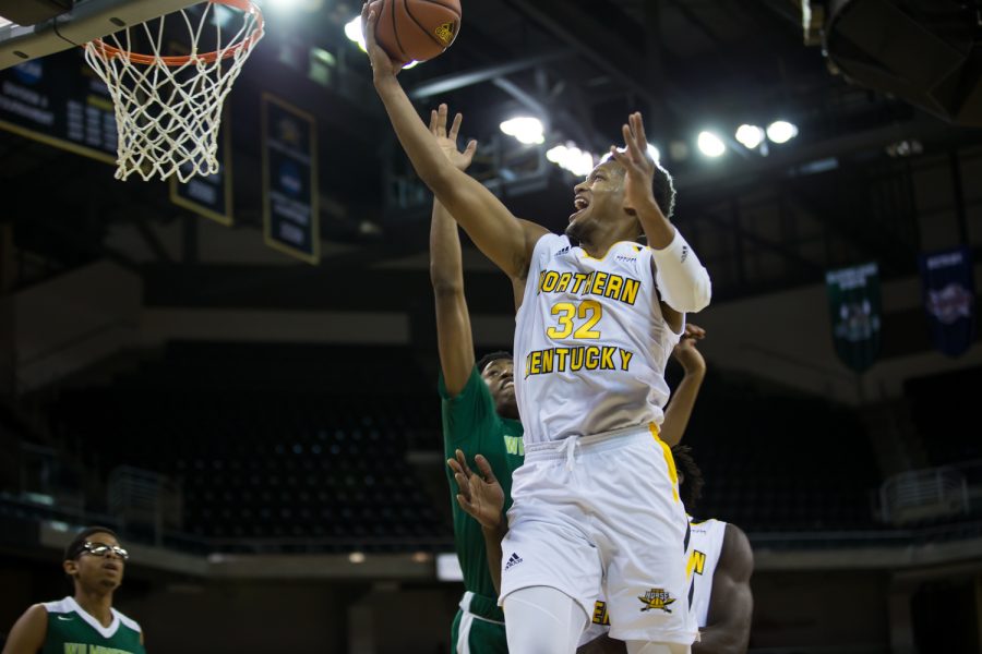 Dantez Walton (32) drives to the basket during the game against Wilmington. Walton went 4-of-7 from the field.