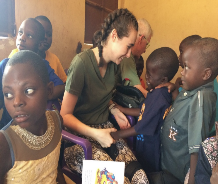 Mann serving children of Uganda. Mann loves to visit Uganda and love those in need.