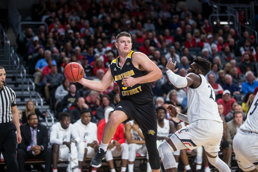 Drew McDonald (34) looks to pass during the game against UC. McDonald led the team 4 turnovers on the game.