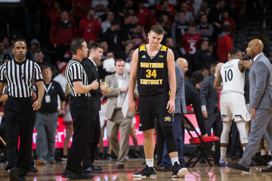 Drew McDonald (34) reacts to a foul on the court during the game against UC. McDonald had 3 fouls on the night and had only 8 points on the game.