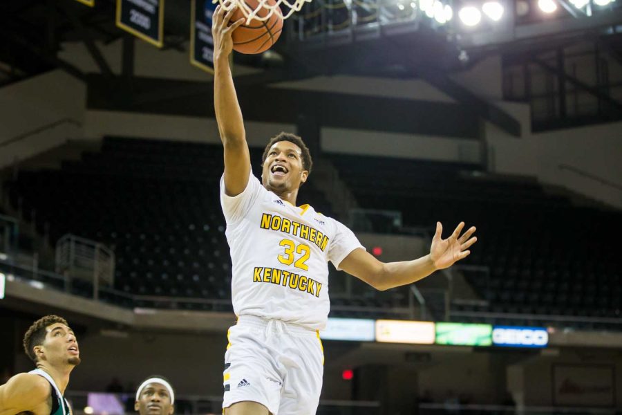 Dantez Walton (32) goes up for a shot during the game against Green Bay. Walton had 17 points on the night.