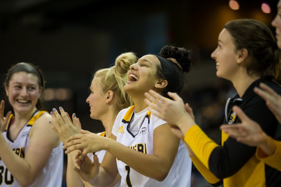 NKU players cheer after a point made during the game against Oakland. The Norse defeated Oakland 72-50.