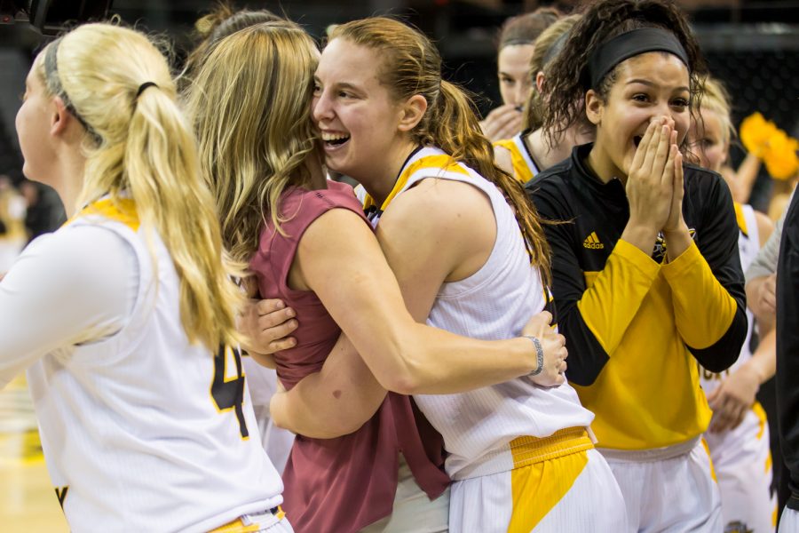 Molly Glick (24) hugs Head Coach Camryn Whitaker after her game winning thee point basket during the game against Youngstown State. The ball was inbounded with 1.0 second on the clock. The basket led the Norse to a 65-62 win over Youngstown State.