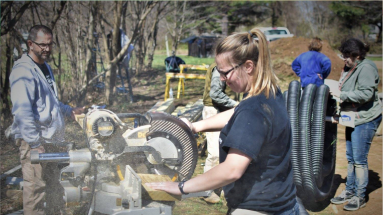 Student from last years trip working on site