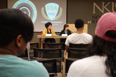 Presidential candidate Janiah Miller, junior sociology and integrative studies major, sits next to running mate, Lexi Anderson, sophomore communication studies major.