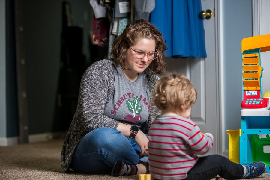 Charley Kalfas plays with her son, Sammy. 