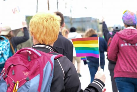 File photo. Students walk through NKU's campus to celebrate Pride Week.