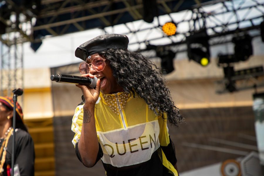 Aziza of Triiibe sports octagonal glasses and a leather beret.