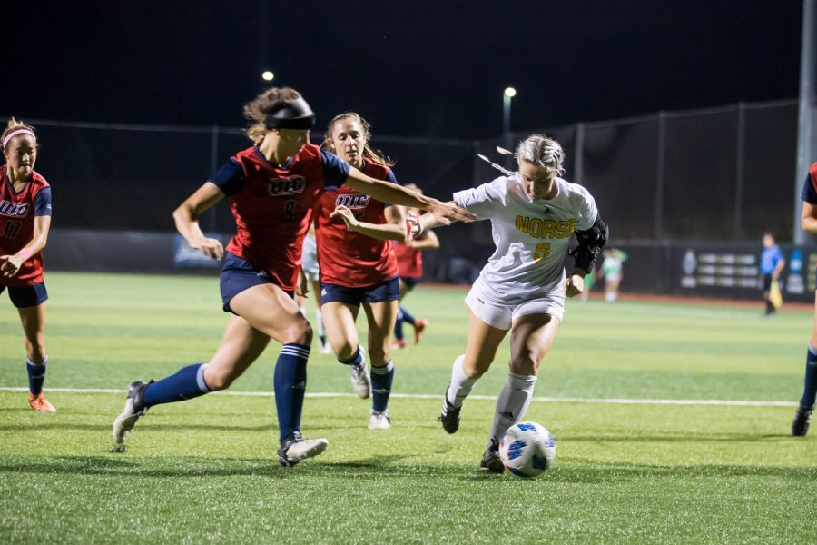 Ashleigh Cronin (5) dribbles toward the goal during the game against UIC. The Norse fell to UIC 1-0 on Saturday night.