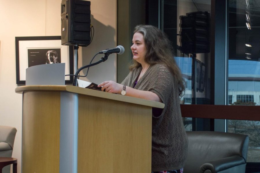 Megan Henson reading her poems from her book 'What Pain Does'