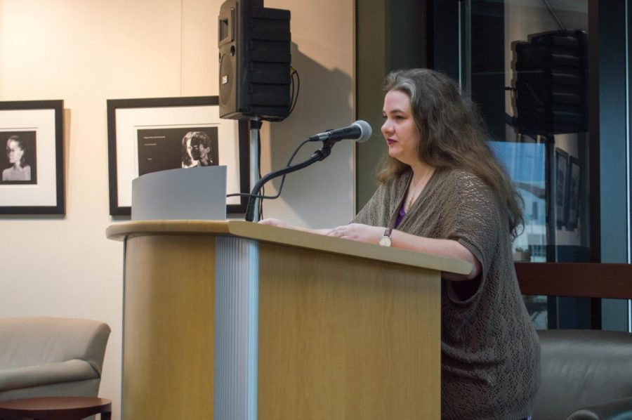 Megan Henson reading her poems from her book 'What Pain Does'