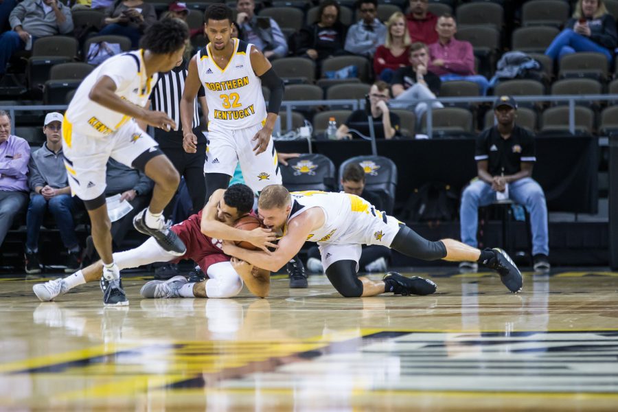 Tyler Sharpe (15) goes for a loose ball during the game against Transylvania. Sharpe had 6 total points on the night and had 5 steals.