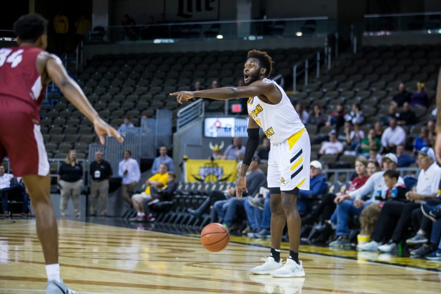 Trevon Faulkner (12) talks to the team during the game against Transylvania. Faulkner shot 3-of-4 on the night and had 8 points.