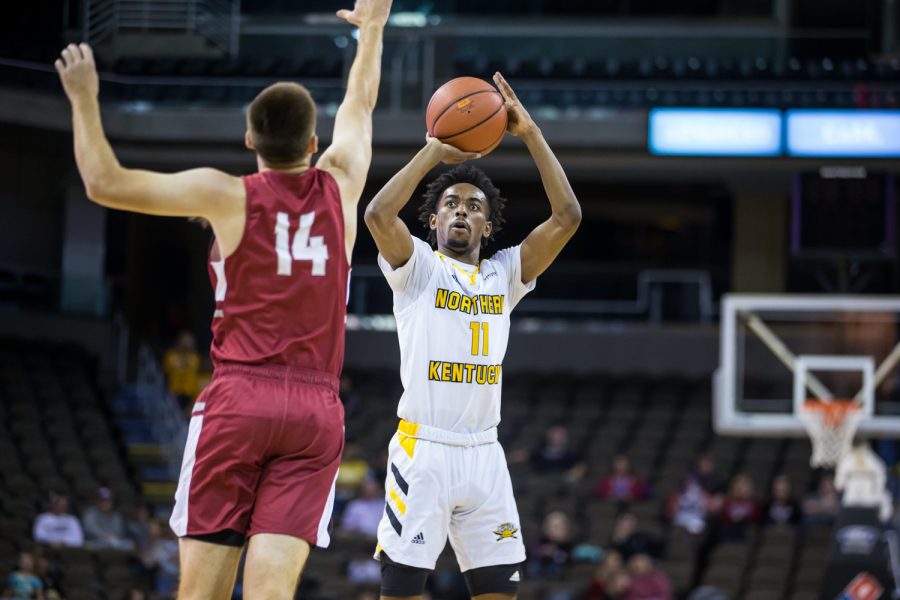 Jalen Tate (11) shoots during the game against Transylvania. Tate led the team with 22 points on the game and shot 7-of-10 on the night and went 2-of-3 from three.