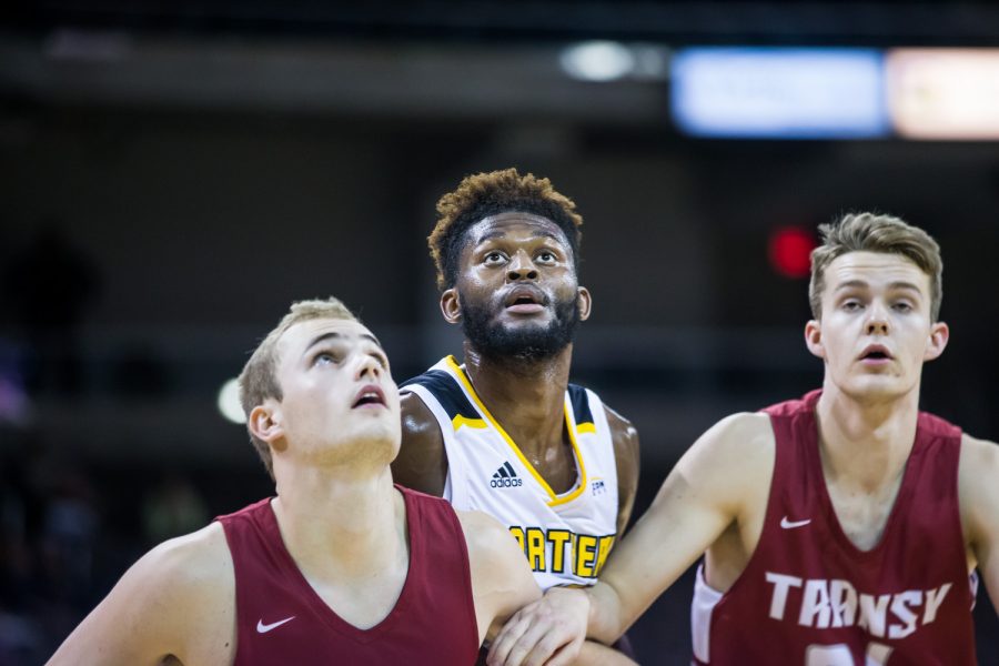 Trevon Faulkner (12) waits for a rebound after a free throw during the game against Transylvania. The Norse defeated Transylvania 71-45.