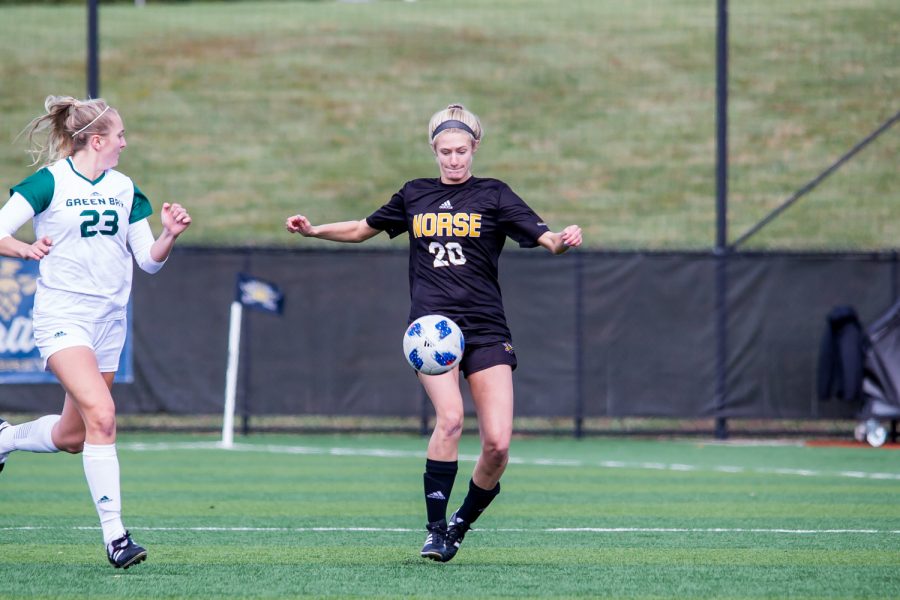 Megan Sullivan (20) plays a ball in the air during the game against Green Bay. The Norse defeated Green Bay 5-1 during the game on Sunday afternoon.