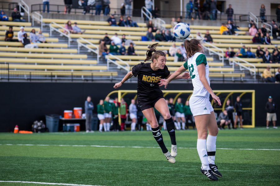 Shawna Zaken (8) goes up for a head ball during the game against Green Bay. The Norse defeated Green Bay 5-1 during the game on Sunday afternoon.