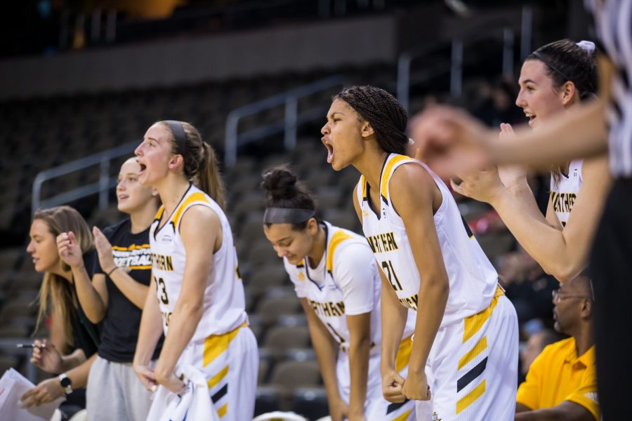 NKU players cheer after a shot during the game against Davis & Elkins College. The Norse defeated Davis & Elkins College 73-47 on the night.