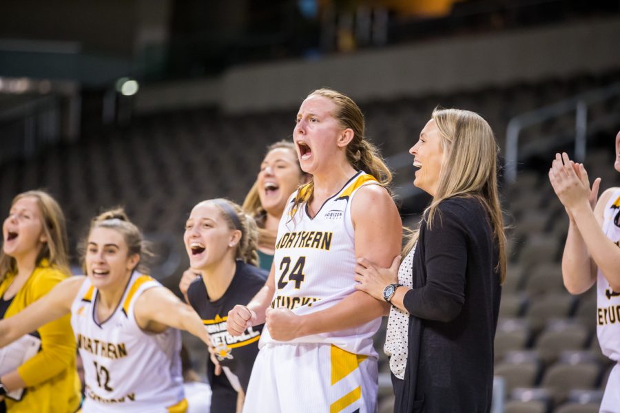 Molly Glick (24) cheers after a point during the game against Davis & Elkins College. The Norse defeated Davis & Elkins College 73-47 on Halloween Night.