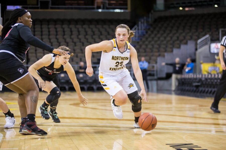 Ally Niece (25) drives toward the basket during the game against Davis &amp; Elkins College. Niece had 8 points and shot 3-of-12 on the night.
