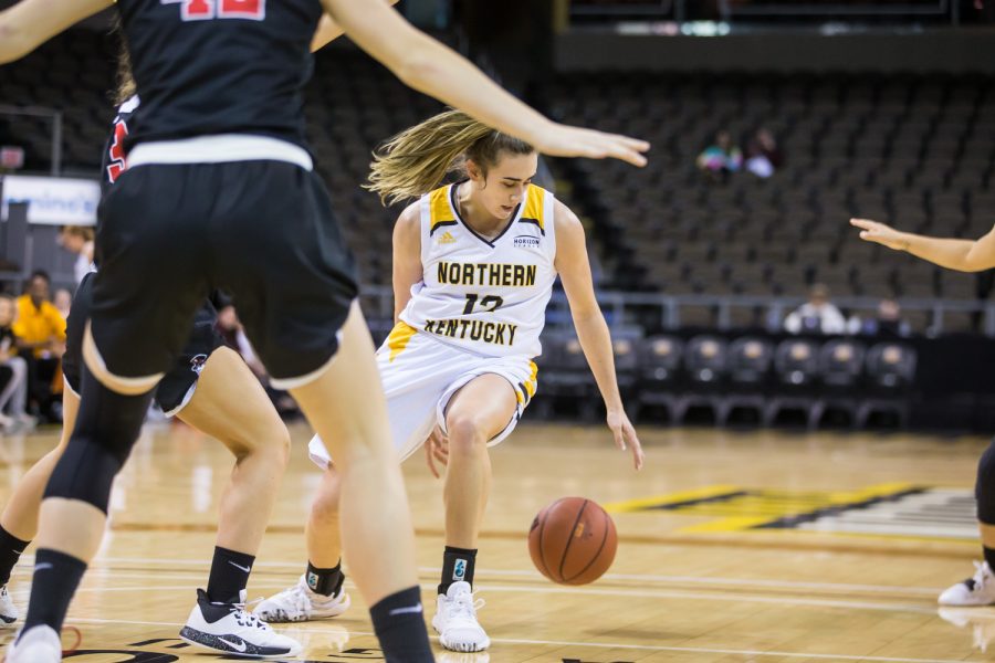 Carissa Garcia (12)  dribbles the ball during the game against Davis &amp; Elkins College. Garcia shot 7-of-16 and had 16 points on the night.