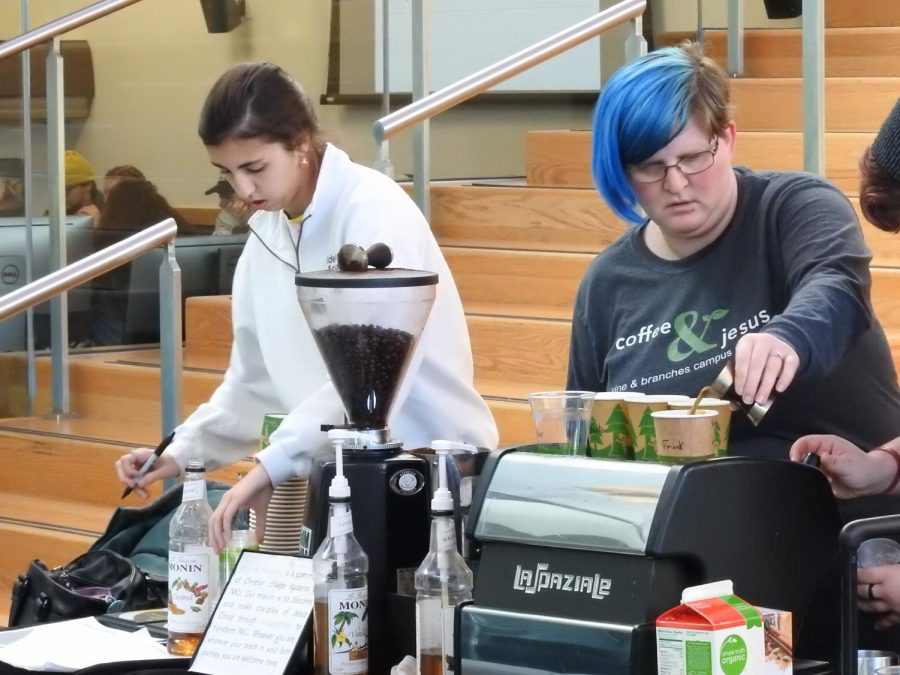 Andrea Rinck and Renee Jennings pour coffee in Griffin Hall lobby.