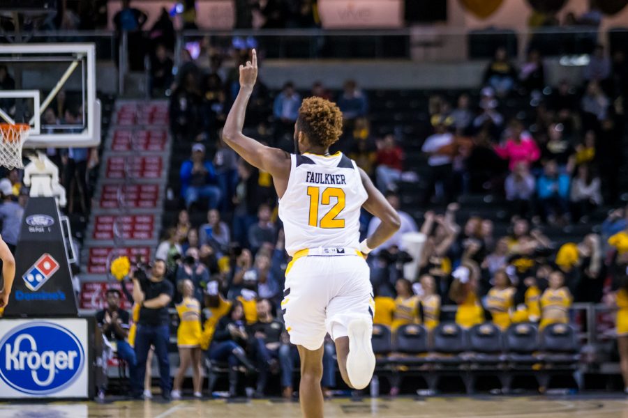 Trevon Faulkner (12) reacts after a point during the game against UC Clermont. Faulkner shot 5-of-11 from the field and 0-of-3 from three on the game.