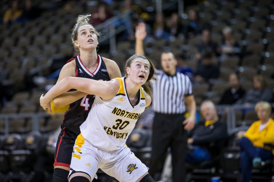 Emmy Souder (30) fights to get a rebound during the game against the University of Nebraska at Omaha. Souder had 5 rebounds on the game and 1 steal.