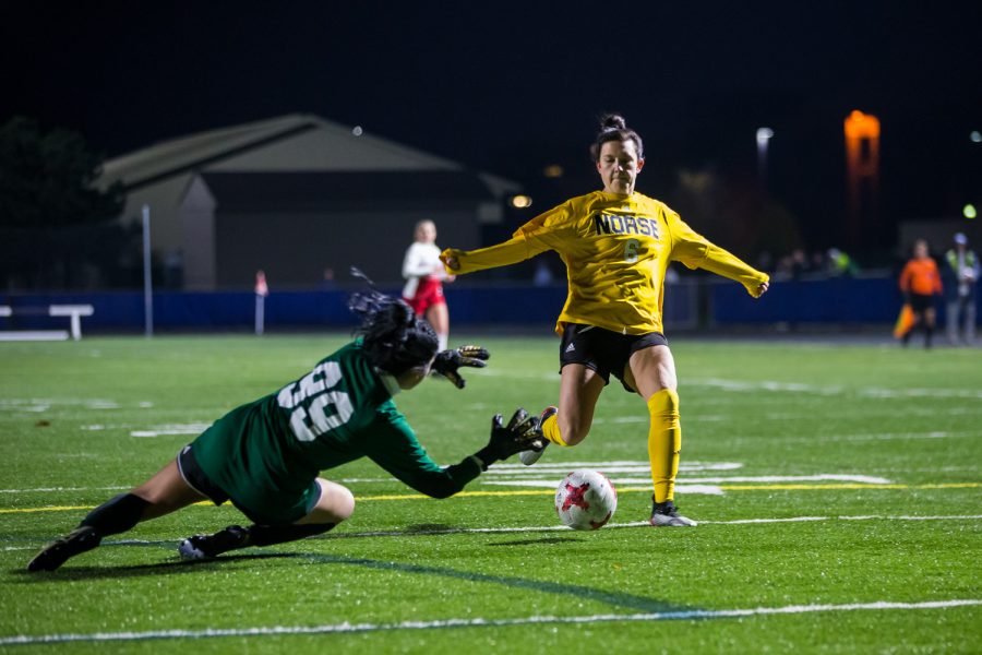 Ally Perkins (6) fights to get a shot past the Detroit Mercy Keeper During the game in Detroit on Friday Night. The Norse Defeated Detroit Mercy 2-0 on the night.