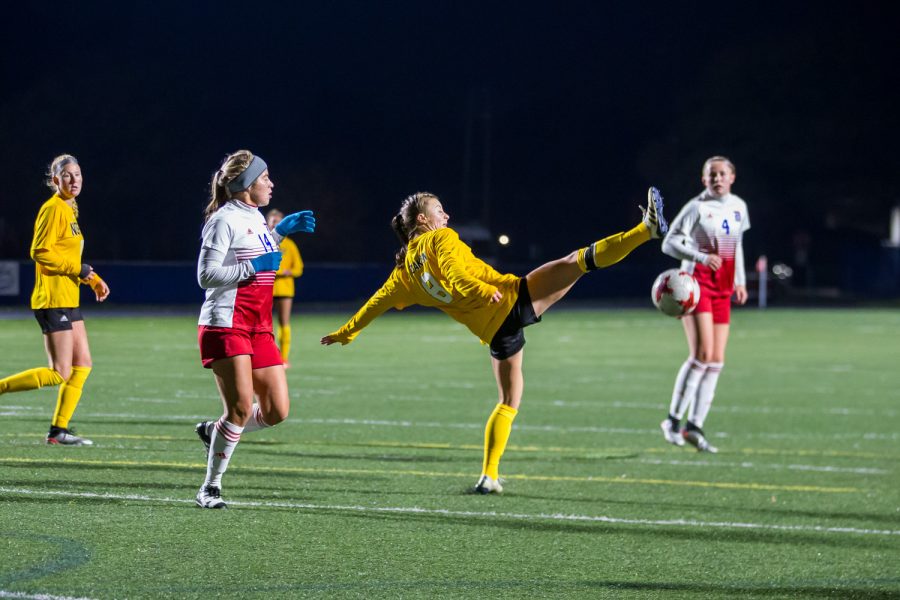 Shawna Zaken (8) fights to reach a ball in the air during the game against Detroit Mercy in Detroit on Friday Night. The Norse Defeated Detroit Mercy 2-0 on the night.