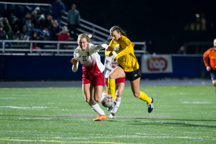 Kiley Keehan (2) fights to get past a Detroit defender during the game against Detroit Mercy in Detroit on Friday Night. The Norse Defeated Detroit Mercy 2-0 on the night.