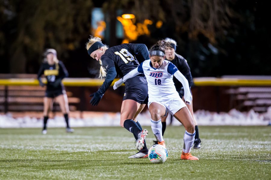 Chloe Mills (19) fights for control of the ball during the semifinal game of the Horizon League Tournament against UIC. The Norse fell to UIC 1-0 in double overtime.