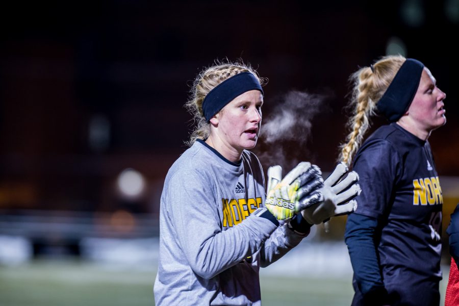 Mimi Stines warms up before the start of the second overtime period during the semifinal game of the Horizon League Tournament against UIC. Stines was credited with 11 saves on the game.