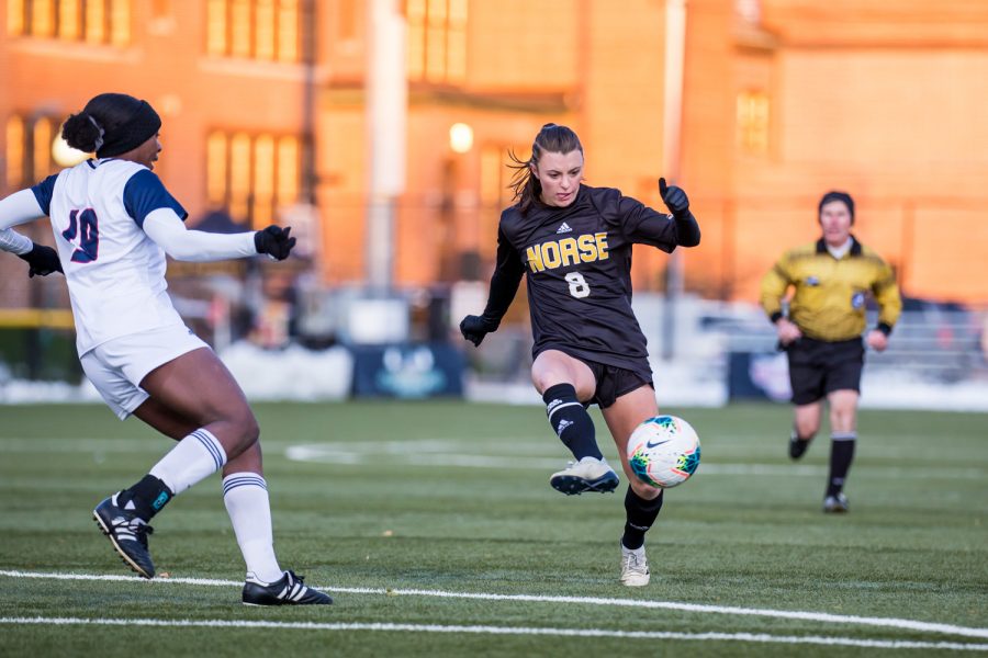 Shawna Zaken (8) passes the ball to a teammate during the semifinal game of the Horizon League Tournament against UIC. The Norse fell to UIC 1-0 in double overtime.