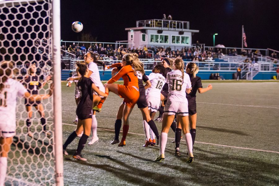 NKU players fights to score with a ball in the air during the quarter final game of the Horizon League Tournament Against Wright State. The Norse defeated Wright State 3-1 and will advance to the Semi-Final game in Milwaukee.