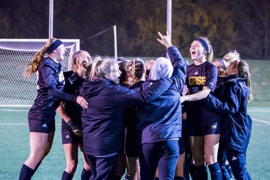 NKU players celebrate after the win against Wright State in the quarter final game of the Horizon League Tournament. The Norse will advance to the semi-final game in Milwaukee.