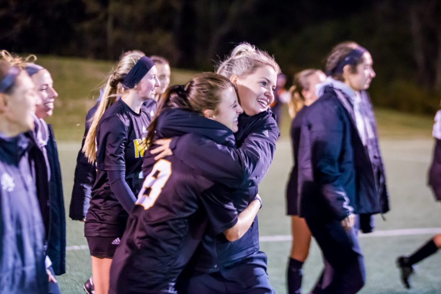 NKU players celebrate after the win against Wright State in the quarter final game of the Horizon League Tournament. The Norse will advance to the semi-final game in Milwaukee.