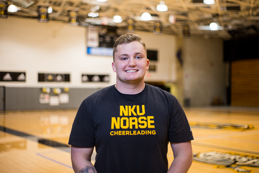 Zachary Stone, a senior Communication Studies major and the eldest member of the cheer staff poses for picture.