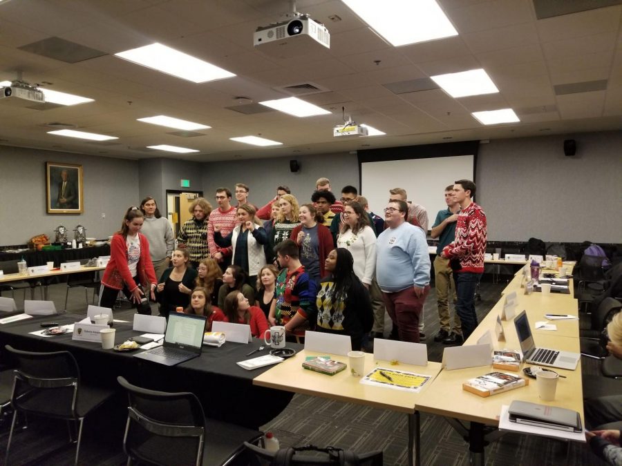 SGA members pose for photo after meeting ends.