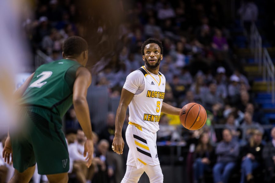 Bryson Langdon (5) watches the clock during the gfame against Cleveland State.  Langdon shot 0-of-8 from the field and had 7 points on the game.